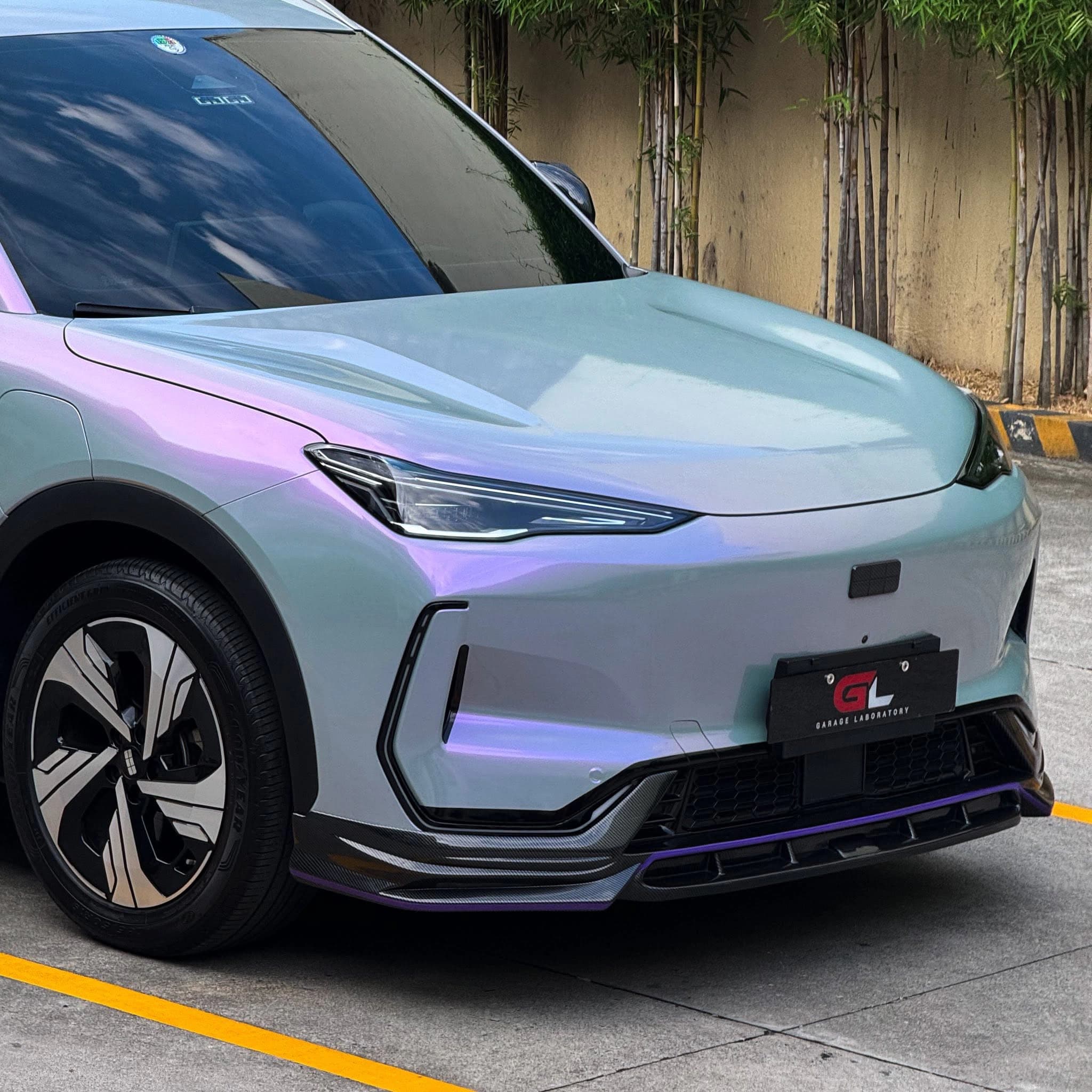 iridescent compact suv front closeup