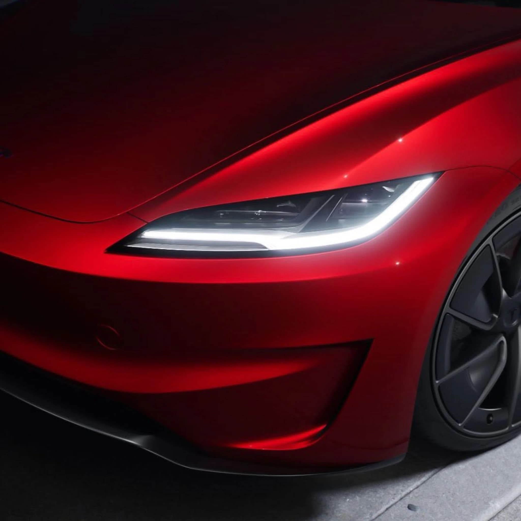 red tesla model 3 front detail