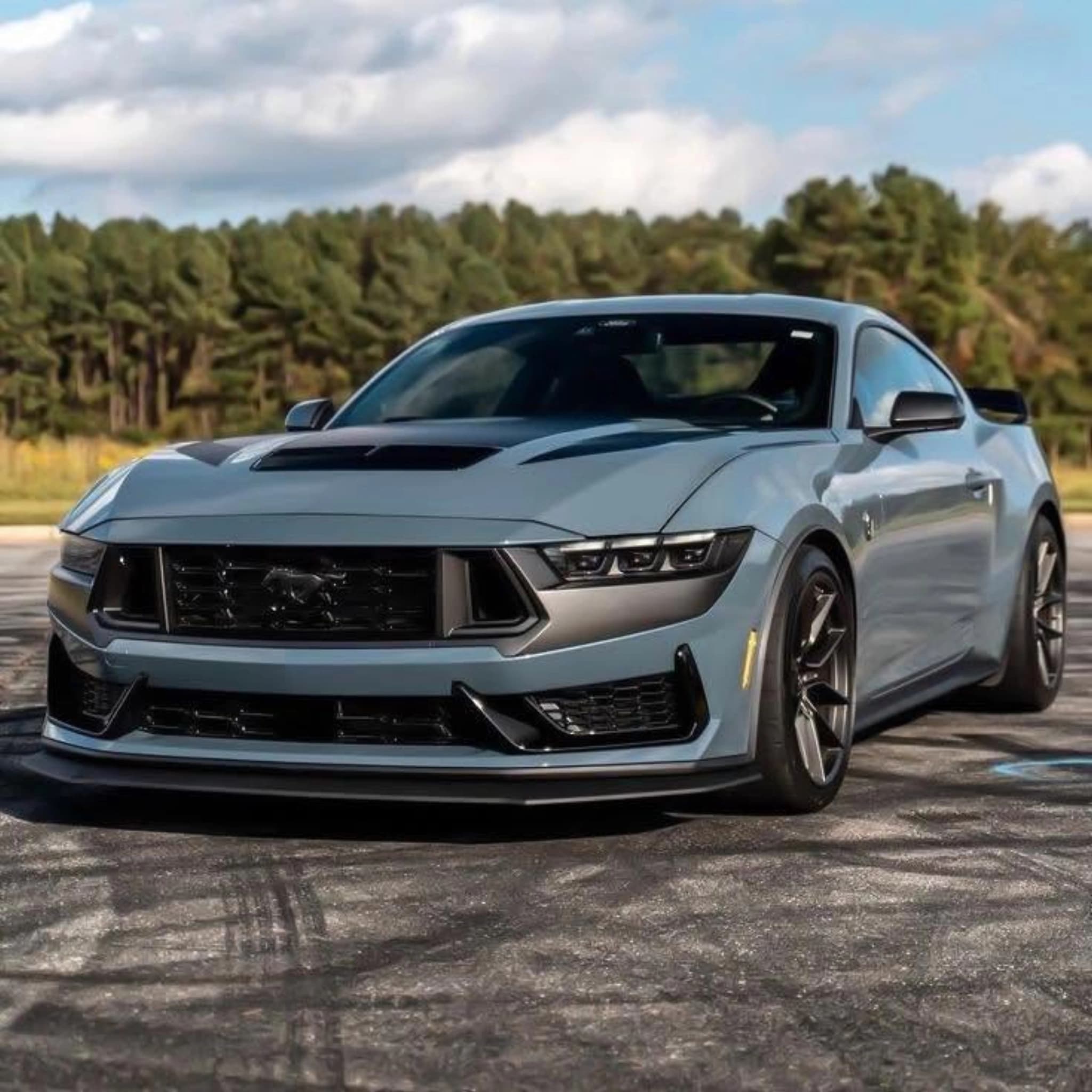 silver ford mustang front angle