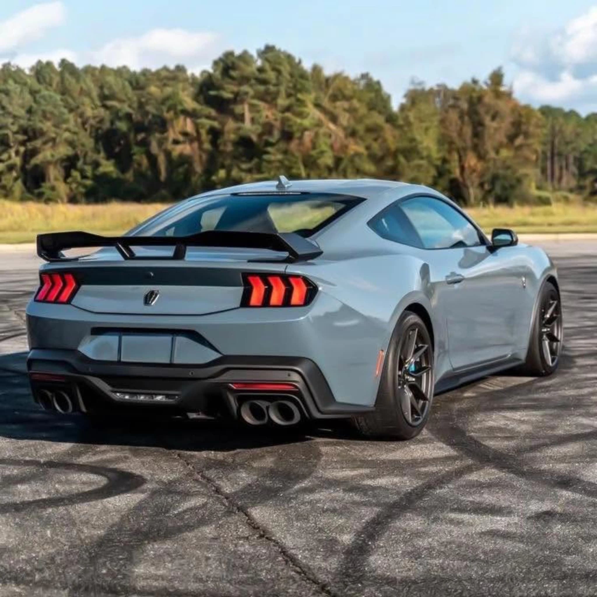 silver ford mustang rear angle
