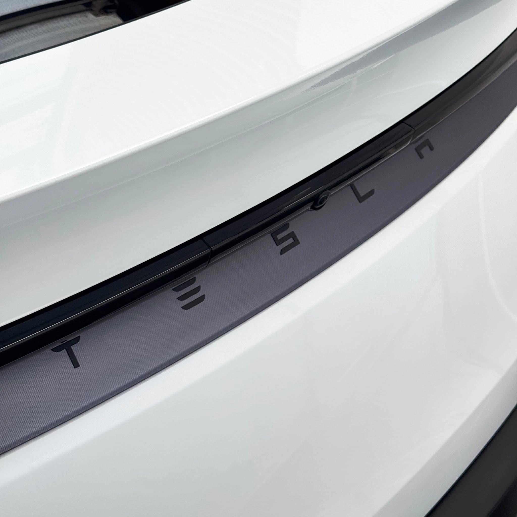 white tesla model y door sill detail