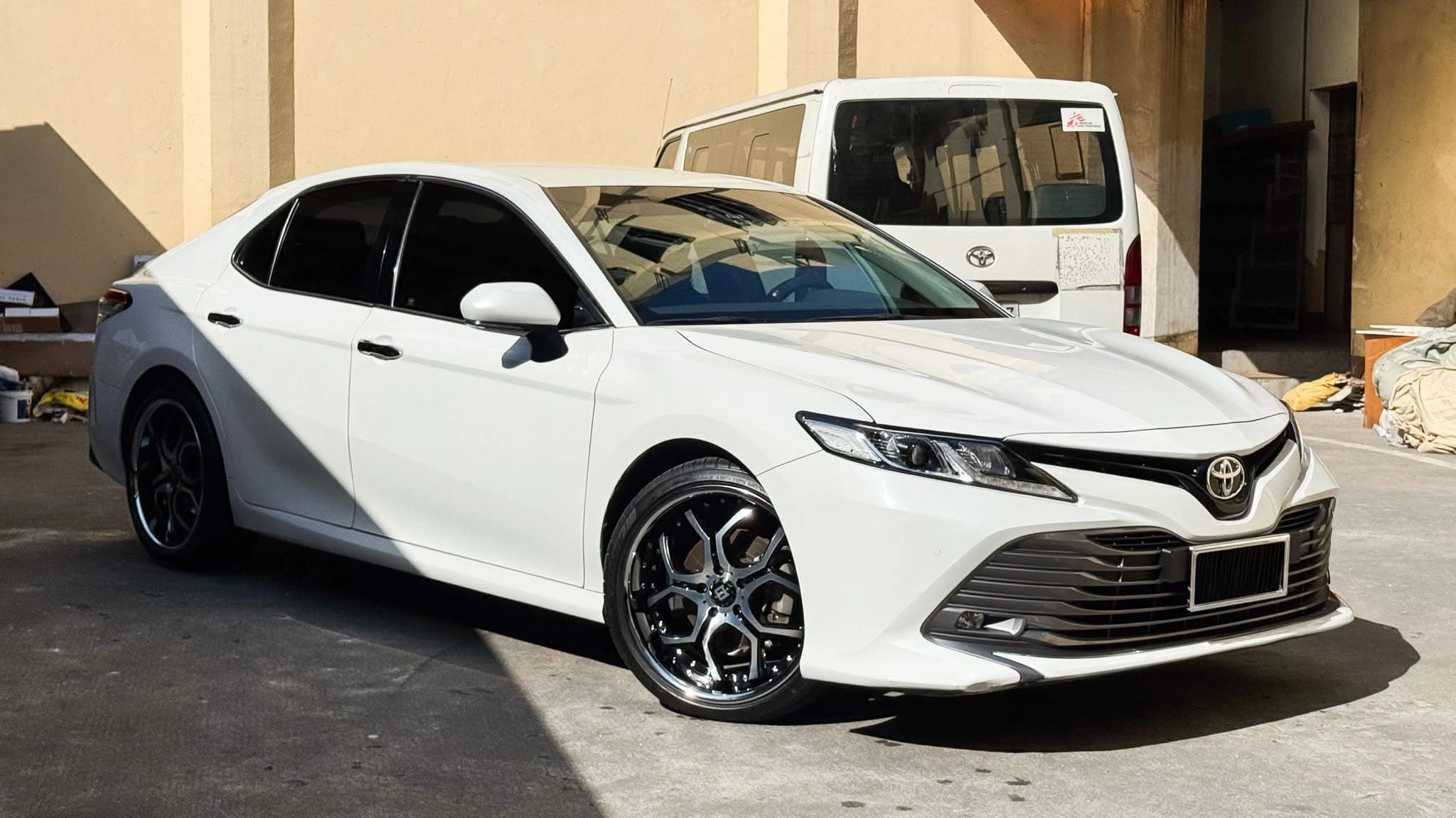 white toyota camry front angle